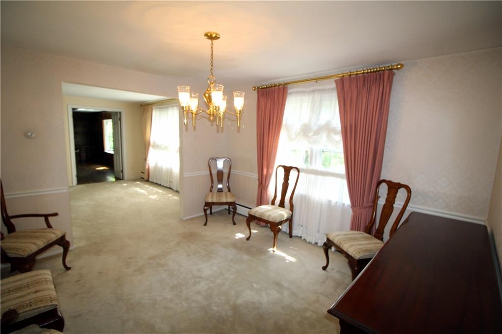 217 Navajo Road Pittsburgh, PA 15241 - Photo 6 of 25 Formal dining room accessed from the living room and kitchen.