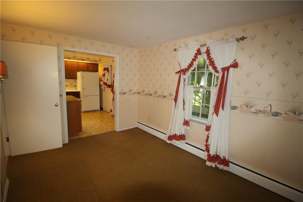 217 Navajo Road Pittsburgh, PA 15241 - Photo 9 of 25 Wall opened between den and kitchen...could be used as a breakfast room.
