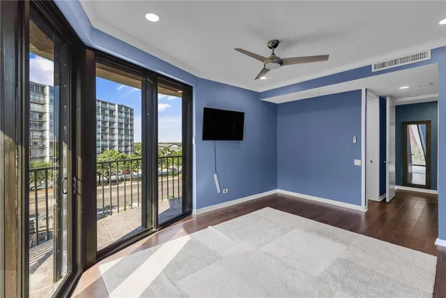 a bathroom with a sink mirror vanity and shower