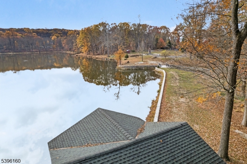 41 Kilroy Road Andover, NJ 07821 - Photo 11 of 11 a view of swimming pool from a lake