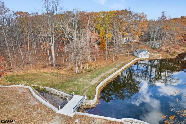 a view of a swimming pool with a yard