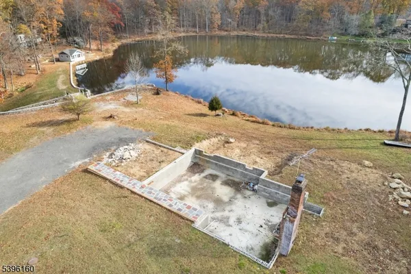 a view of swimming pool from a lake