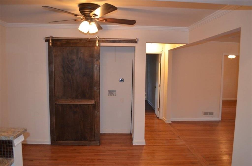 1329 Westridge Road Southwest Atlanta, GA 30311 - Photo 4 of 54 a view of a livingroom with a fan