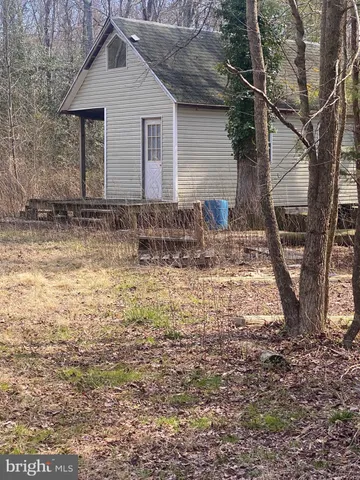 a house view with a yard