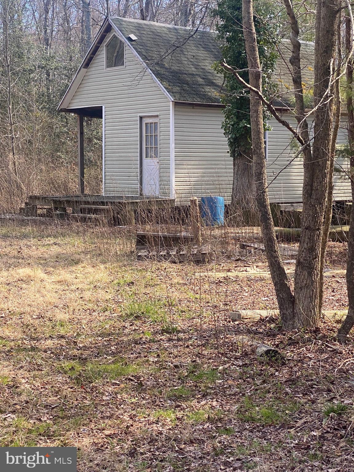 7.01 Savannah Rd Road Georgetown, DE 19947 - Photo 2 of 2 a house view with a yard