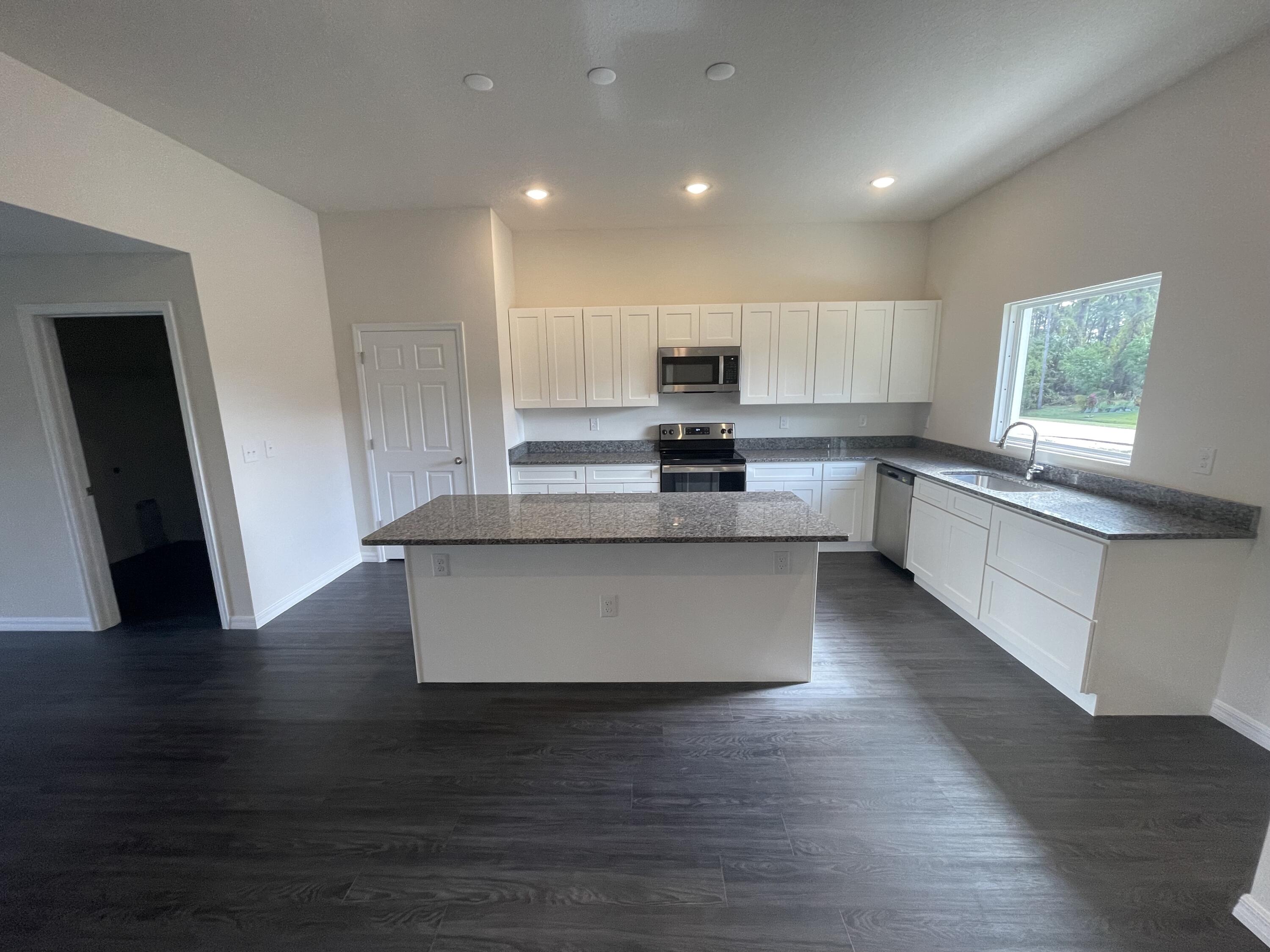 1203 Sexton Road Southwest Palm Bay, FL 32908 - Photo 4 of 10 Sexton Kitchen 3