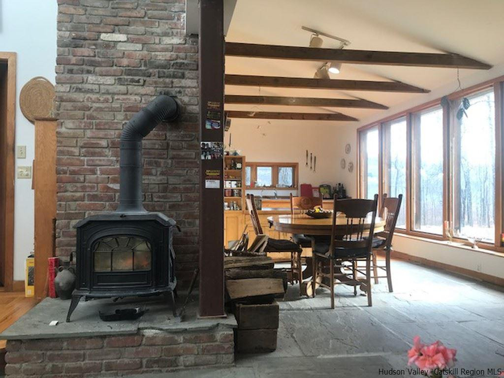 445 Plutarch Road Highland, NY 12528 - Photo 12 of 35 a dining room with furniture and window