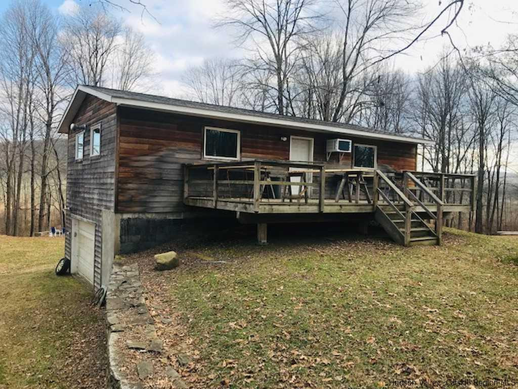 445 Plutarch Road Highland, NY 12528 - Photo 32 of 35 a view of a house with a yard