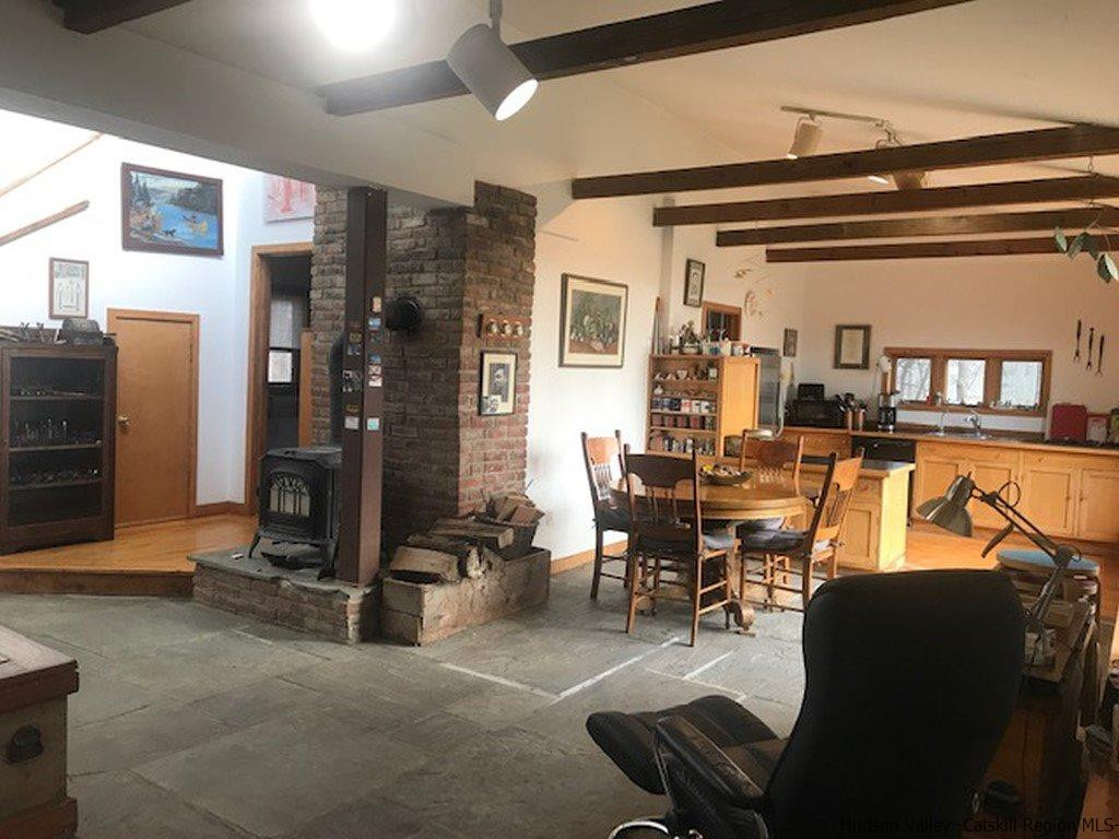 445 Plutarch Road Highland, NY 12528 - Photo 9 of 35 a dining room with furniture and a window