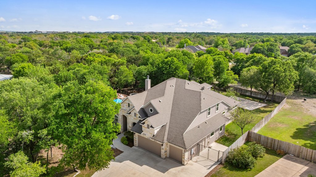108 Berry Cove Georgetown, TX 78628 - Photo 2 of 39 an aerial view of a house with a yard