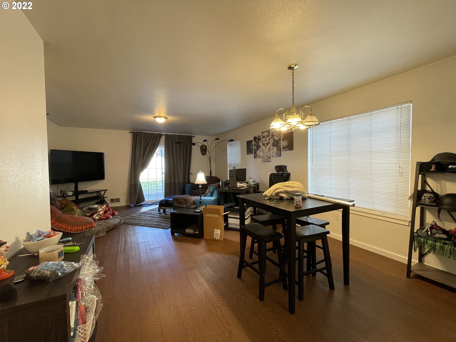 868 Blanco Avenue Coos Bay, OR 97420 - Photo 18 of 29 a living room with furniture a window and a flat screen tv