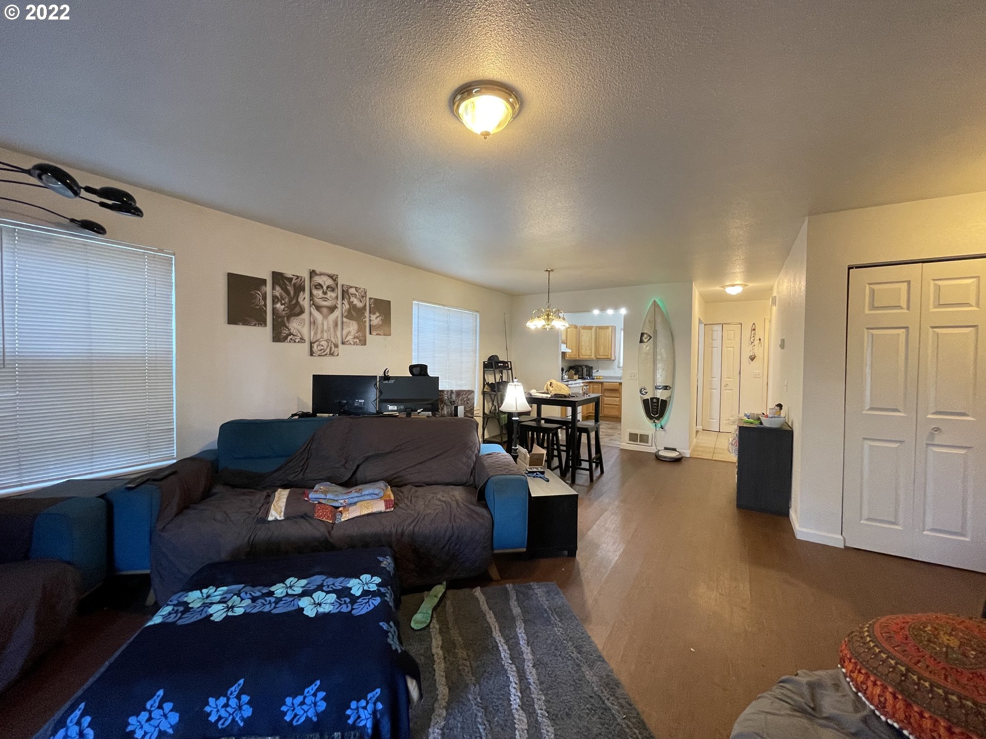 868 Blanco Avenue Coos Bay, OR 97420 - Photo 19 of 29 a living room with furniture and a lamp