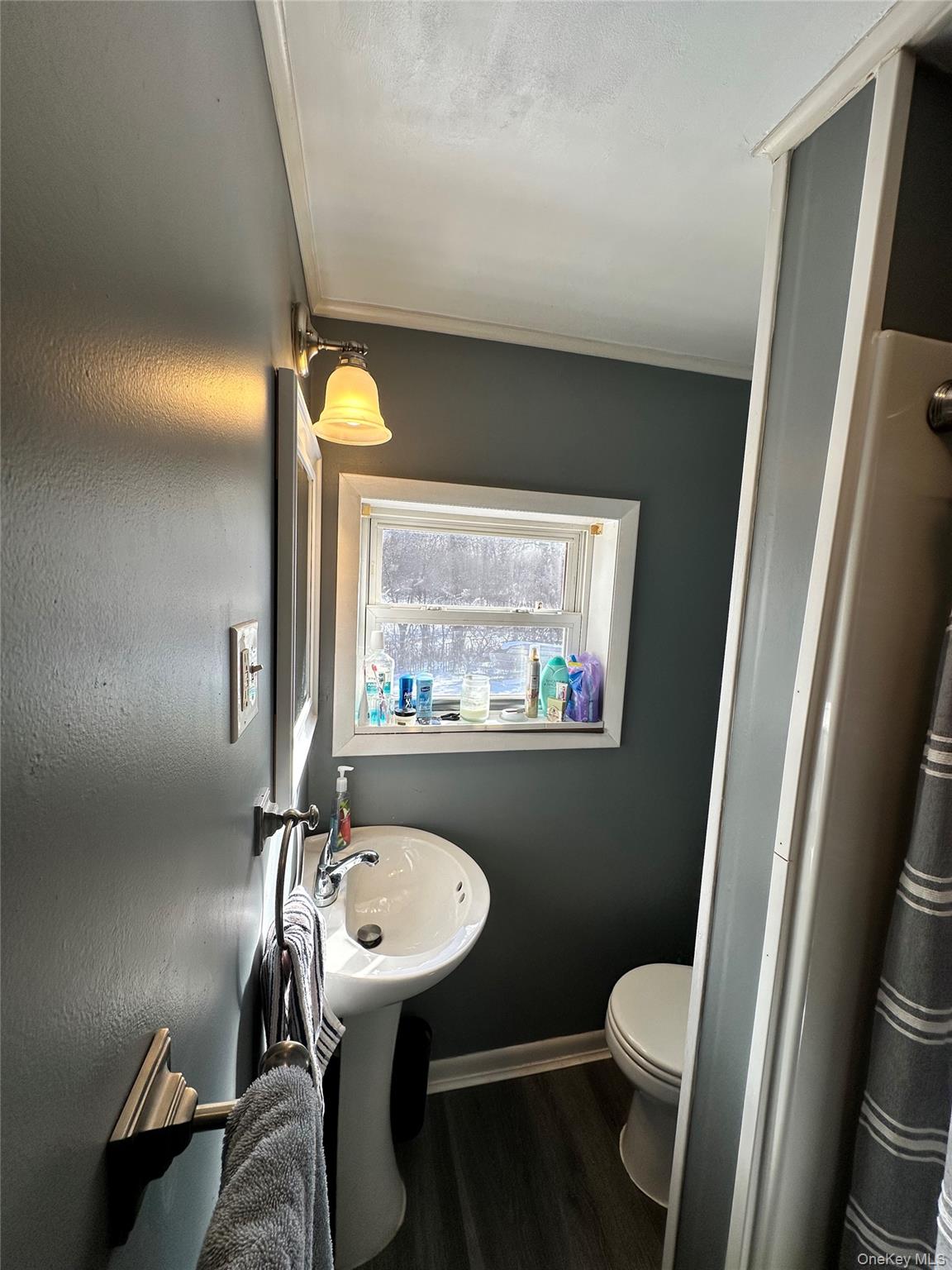 35 Glenmere Road, Unit A Chester, NY 10918 - Photo 11 of 13 a bathroom with a sink toilet and mirror