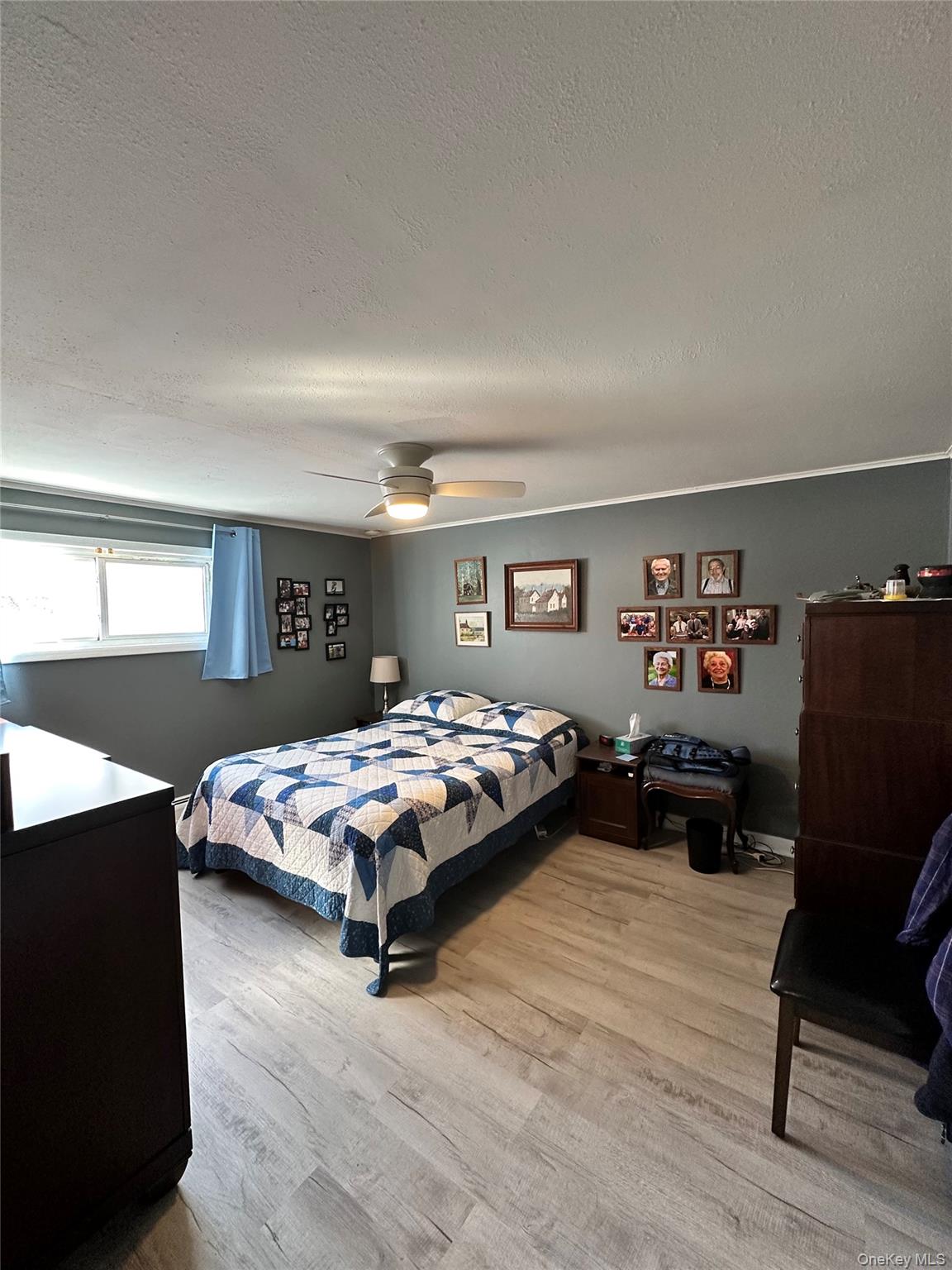35 Glenmere Road, Unit A Chester, NY 10918 - Photo 6 of 13 a bedroom with a bed and wooden floor