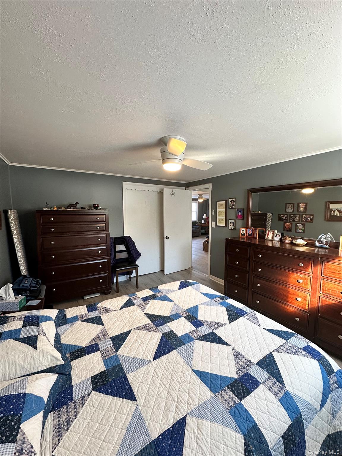 35 Glenmere Road, Unit A Chester, NY 10918 - Photo 7 of 13 a bed room with a bed and a television