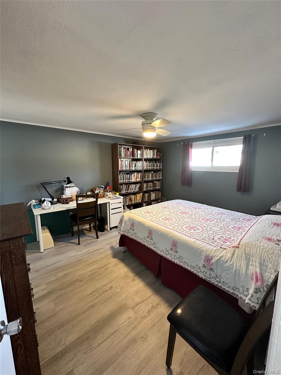 35 Glenmere Road, Unit A Chester, NY 10918 - Photo 8 of 13 a bedroom with a bed and a bookshelf