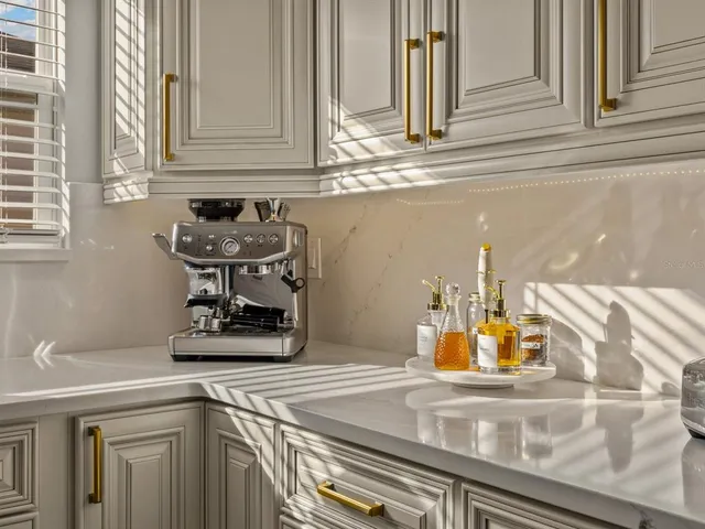 a bedroom with a large bed and a couch