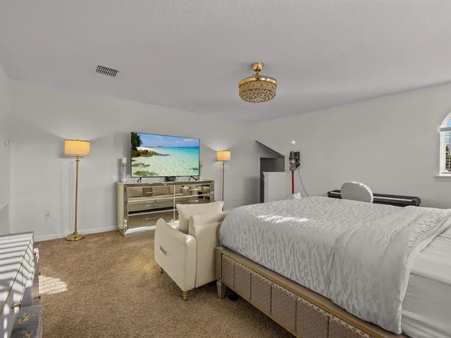 a living room with furniture and couch