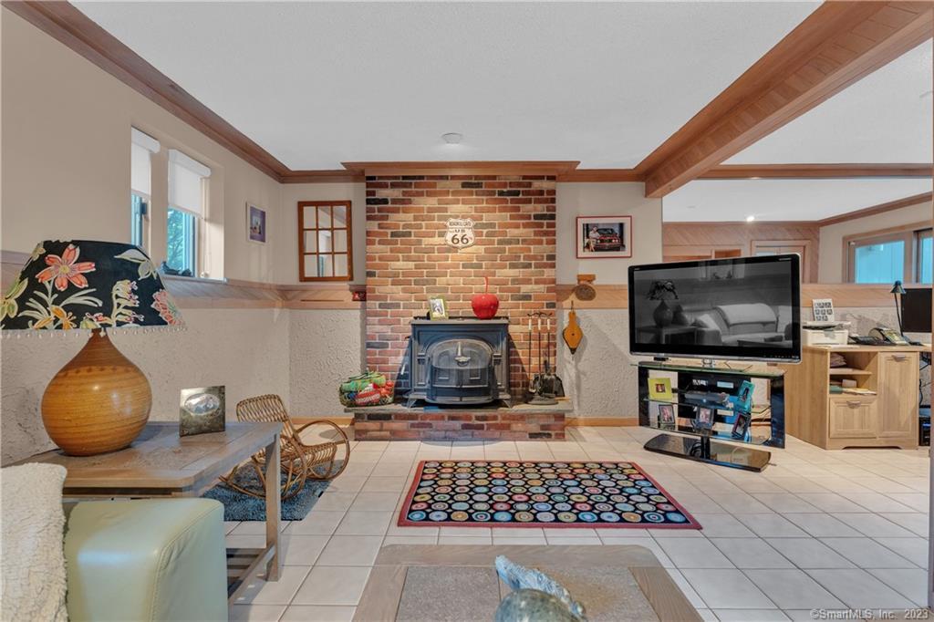940 Durham Road Wallingford, CT 06492 - Photo 28 of 40 The Family Room Has a "Vermont Castings" Wood-Stove to keep things toasty.