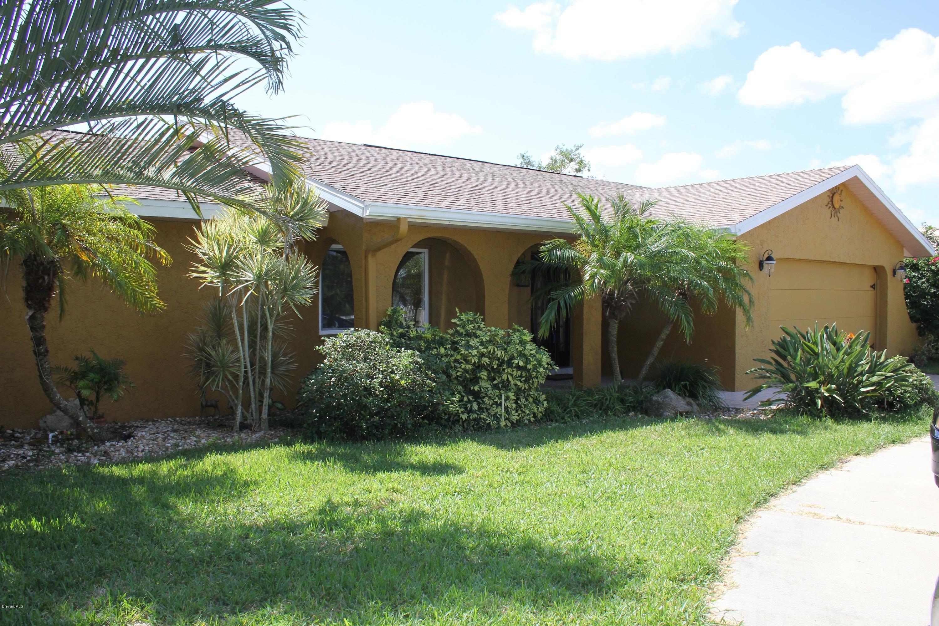 10 Country Club Road Cocoa Beach, FL 32931 - Photo 1 of 18 10 Country Club Front Shot IMG_5930