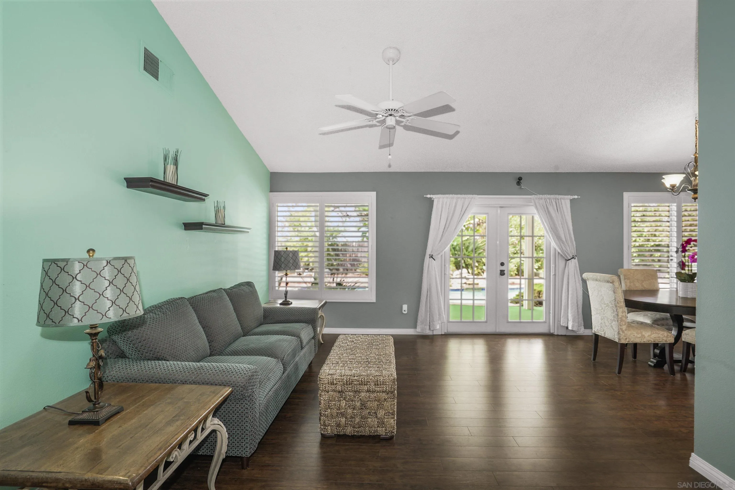 4660 Lofty Grove Drive Oceanside, CA 92056 - Photo 7 of 22 a living room with furniture and a large window