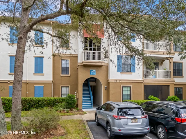 a front view of a house with outdoor space
