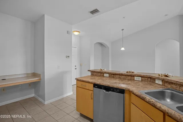 a view of a room with an entryway