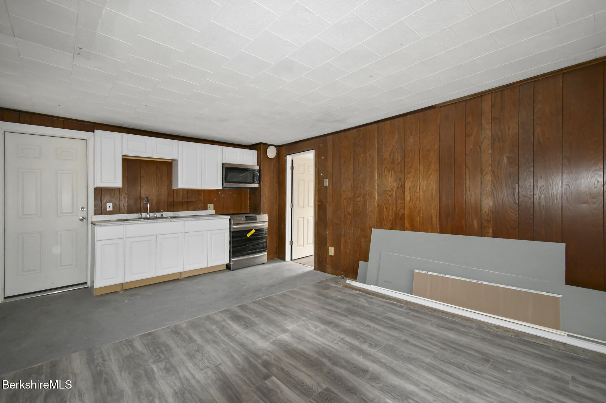 111 Columbia Street Adams, MA 01220 - Photo 26 of 33 a view of kitchen with wooden floor and electronic appliances