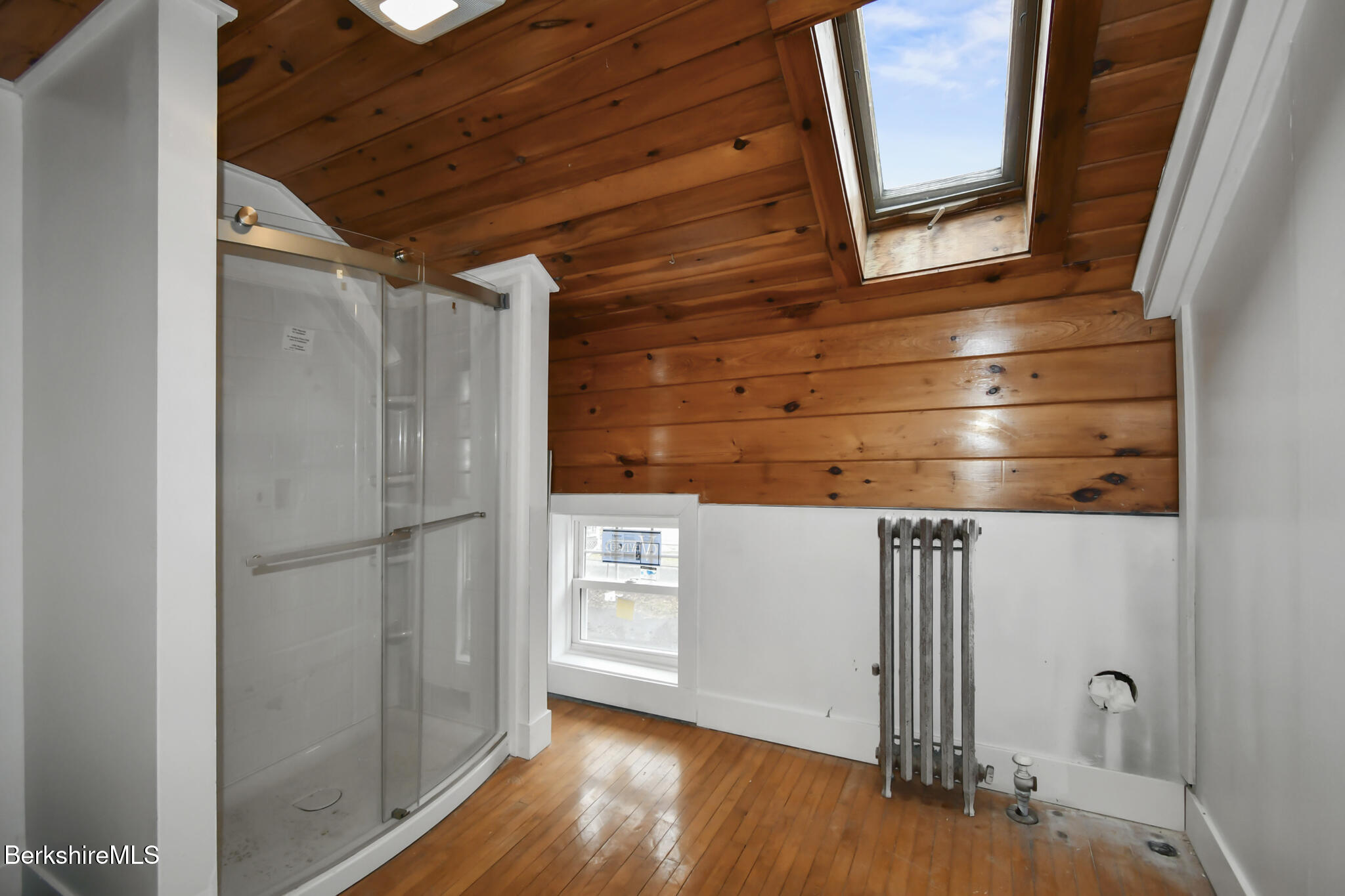 111 Columbia Street Adams, MA 01220 - Photo 7 of 33 a close view of a refrigerator in kitchen and wooden floor