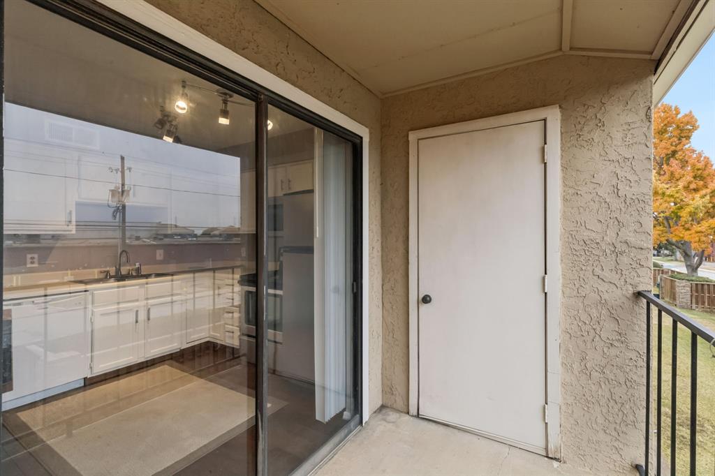 4748 Old Bent Tree Lane, Unit 1808 Dallas, TX 75287 - Photo 19 of 28 a bathroom with a glass door shower and sink