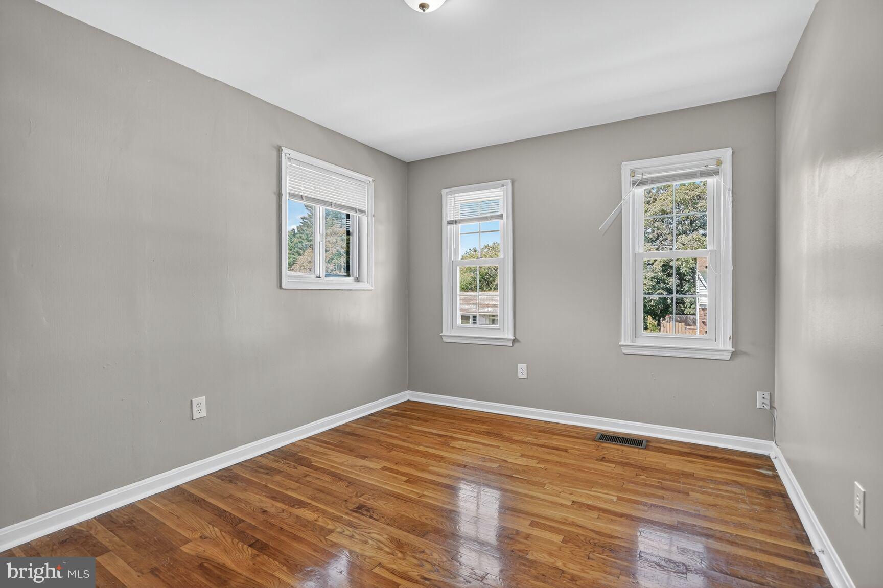 7720 Loudon Drive Fort Washington, MD 20744 - Photo 17 of 28 a view of empty room with wooden floor and fan