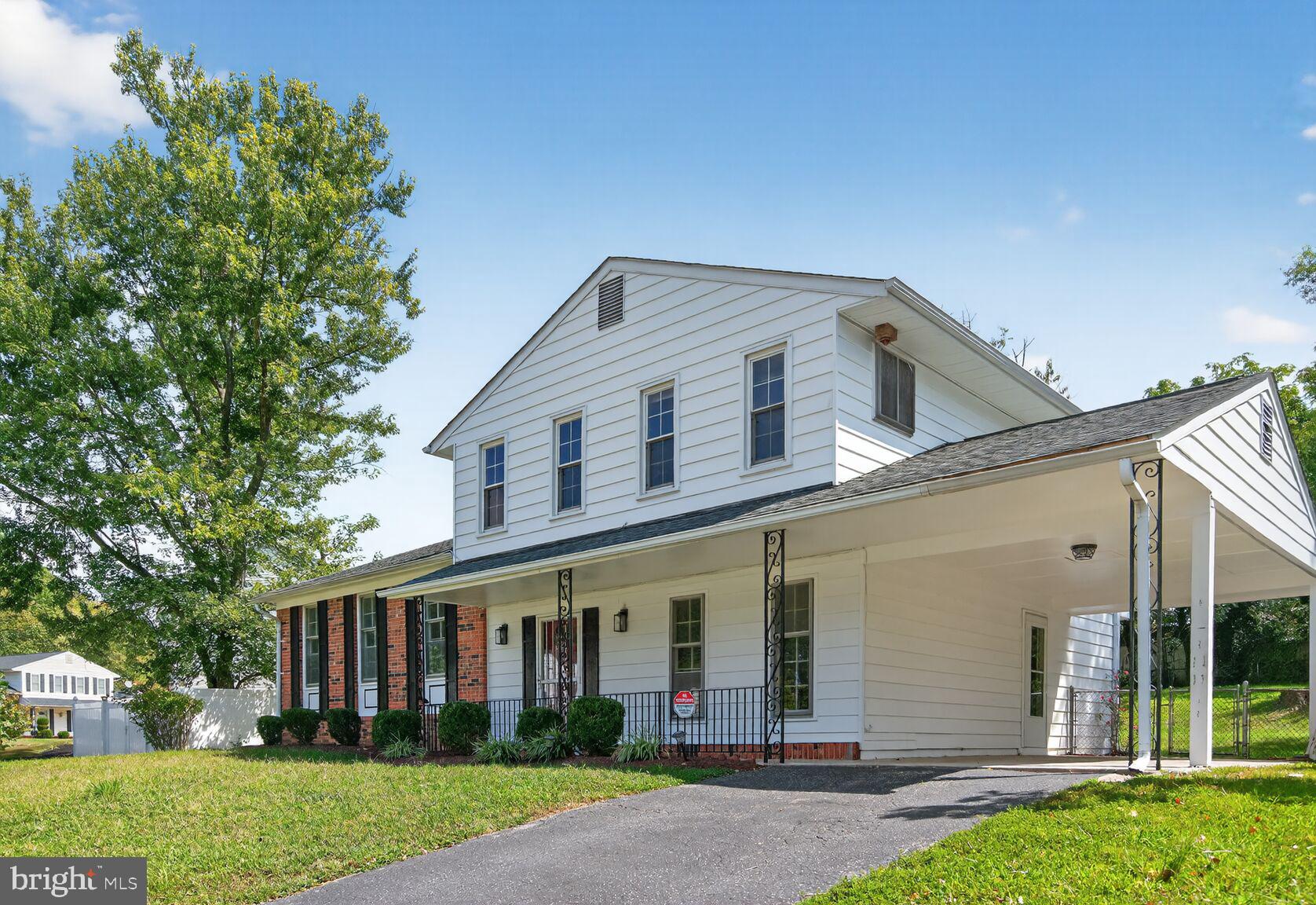 7720 Loudon Drive Fort Washington, MD 20744 - Photo 23 of 28 front view of a house with a yard