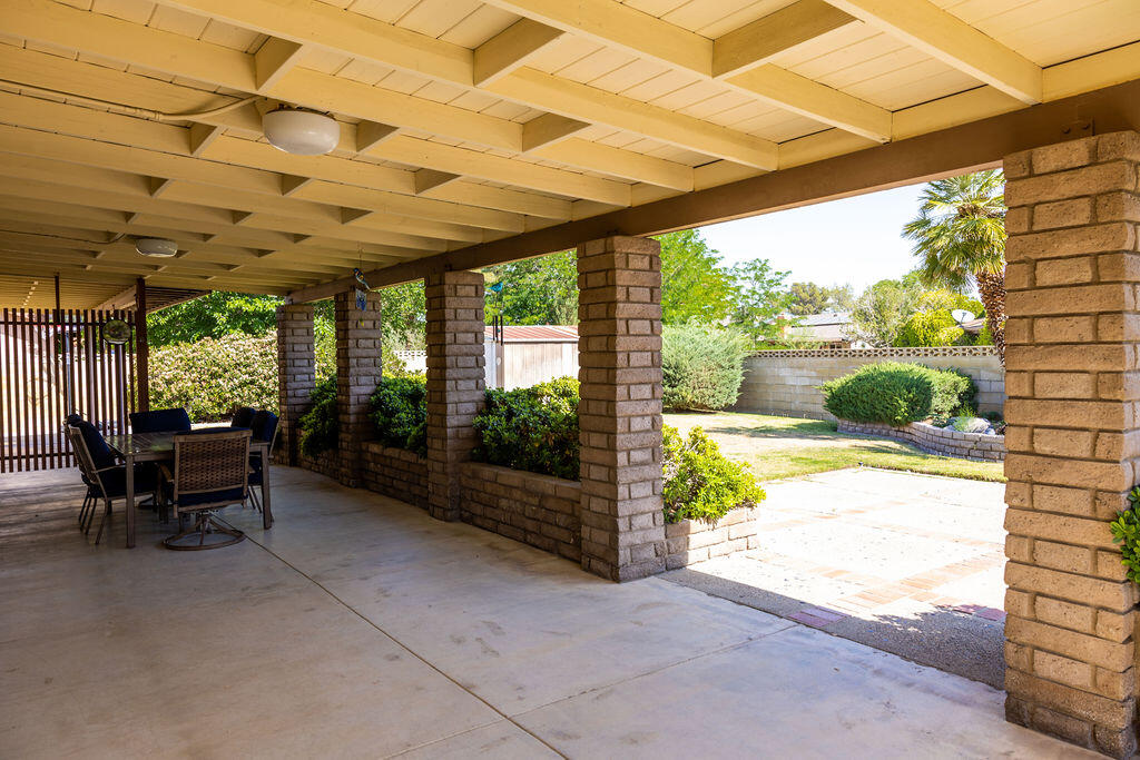 812 West Vicki Avenue Ridgecrest, CA 93555 - Photo 13 of 68 a view of a porch with furniture and a backyard