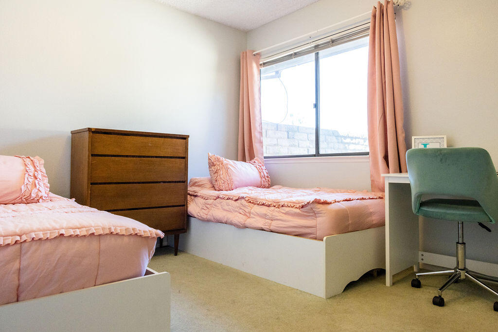 812 West Vicki Avenue Ridgecrest, CA 93555 - Photo 28 of 68 a bedroom with a bed and furniture