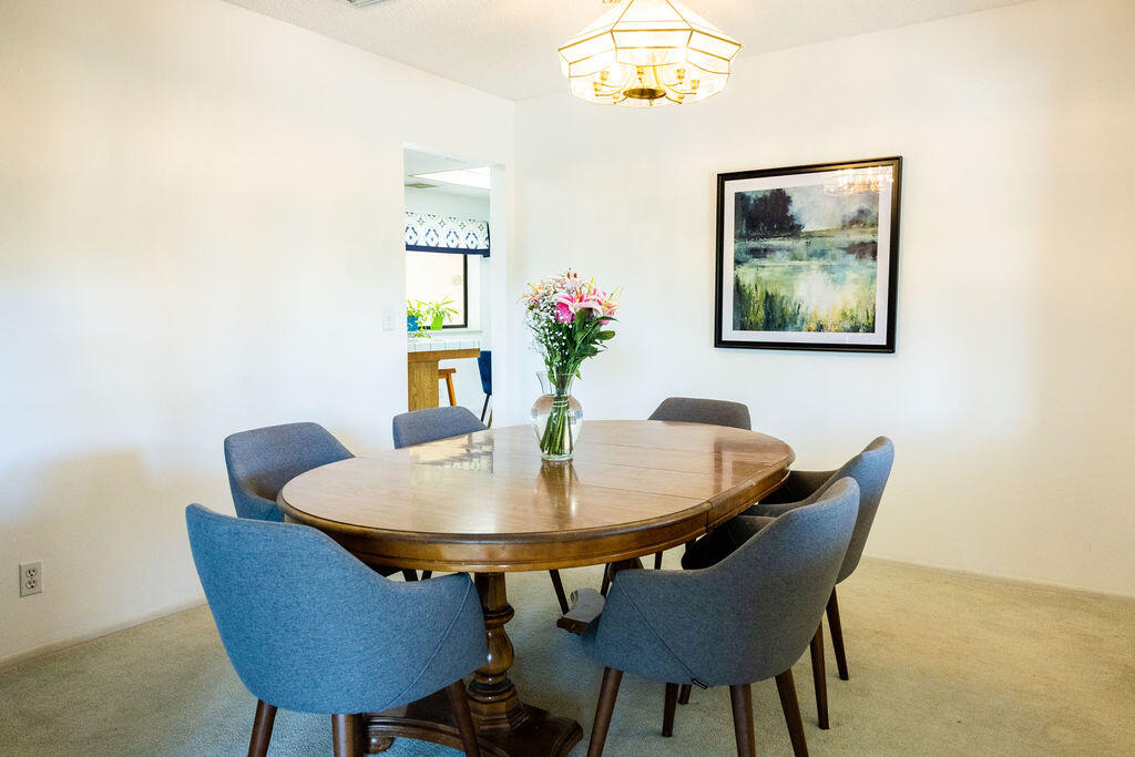 812 West Vicki Avenue Ridgecrest, CA 93555 - Photo 34 of 68 a dining room with furniture and wooden floor