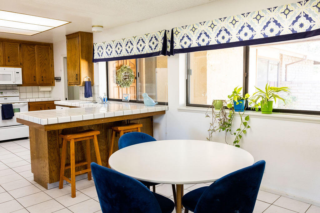 812 West Vicki Avenue Ridgecrest, CA 93555 - Photo 47 of 68 a dining table with chairs and window