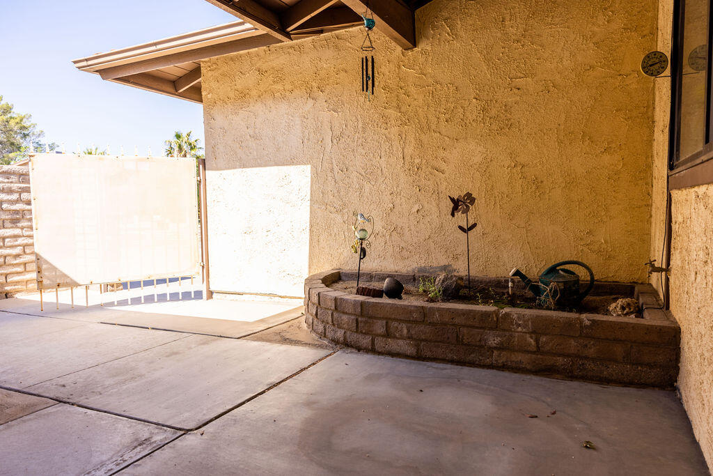 812 West Vicki Avenue Ridgecrest, CA 93555 - Photo 58 of 68 a living room with a couch and a table