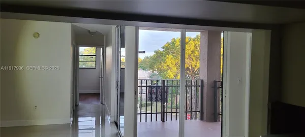 a view of a large window with an outdoor view