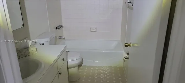 a bathroom with a sink and toilet