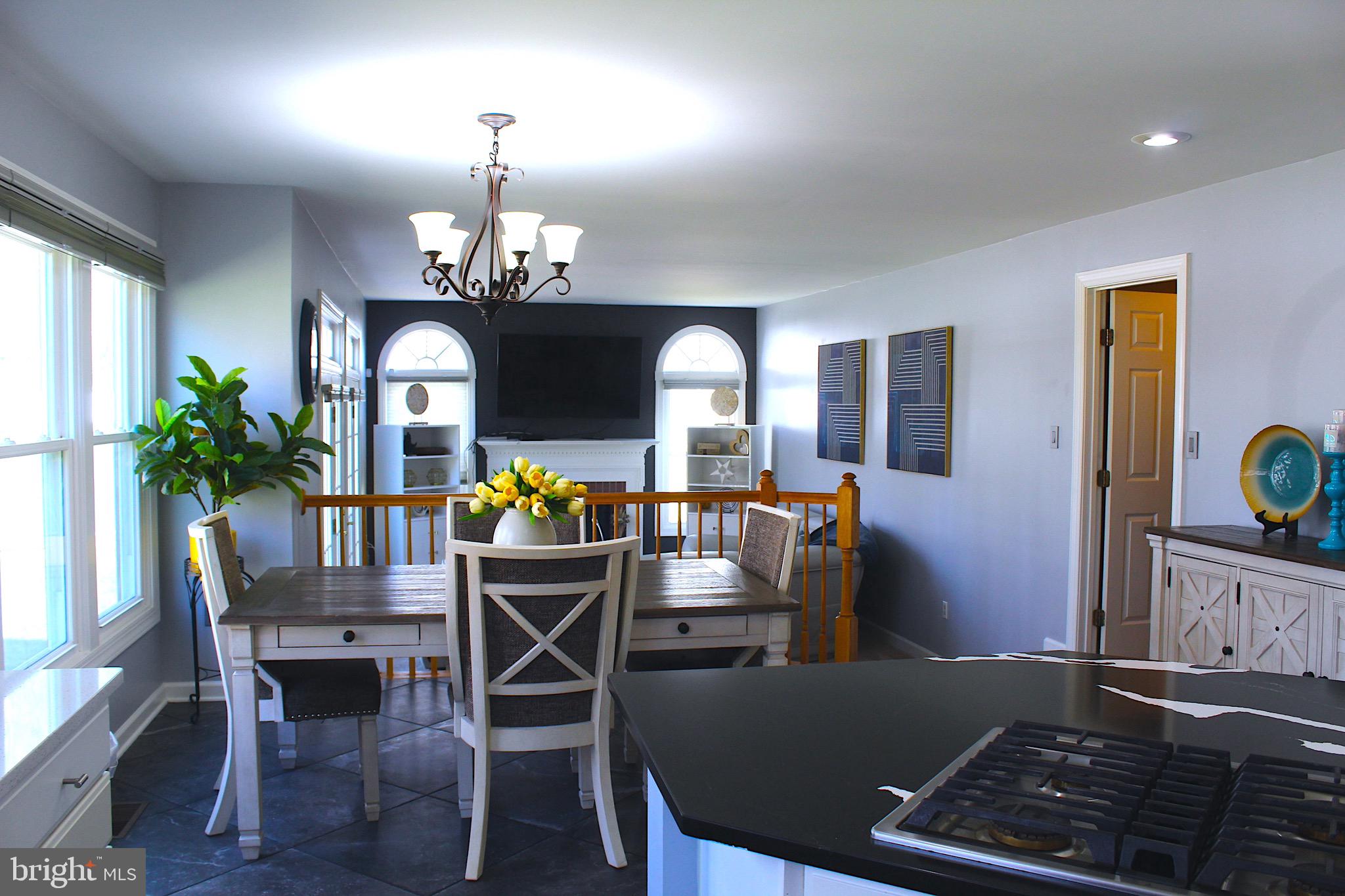 11546 Waesche Drive Bowie, MD 20721 - Photo 11 of 21 a view of a dining room with furniture window and wooden floor