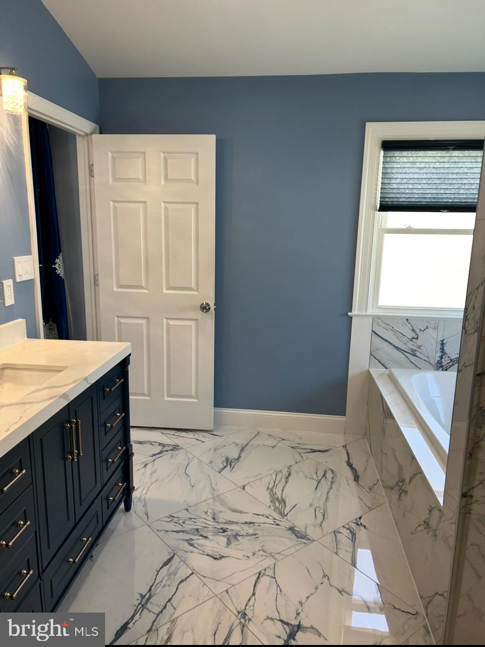 11546 Waesche Drive Bowie, MD 20721 - Photo 14 of 21 a bathroom with a sink and a mirror