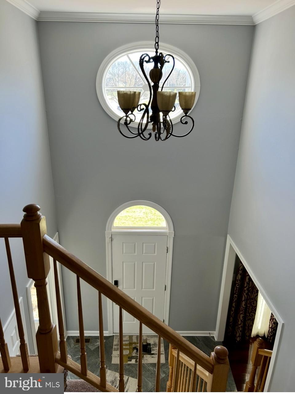 11546 Waesche Drive Bowie, MD 20721 - Photo 19 of 21 a view of a hallway with wooden floor and staircase