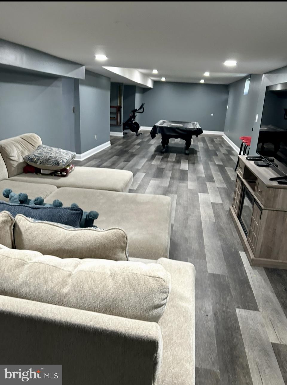 11546 Waesche Drive Bowie, MD 20721 - Photo 21 of 21 a living room with furniture and a flat screen tv