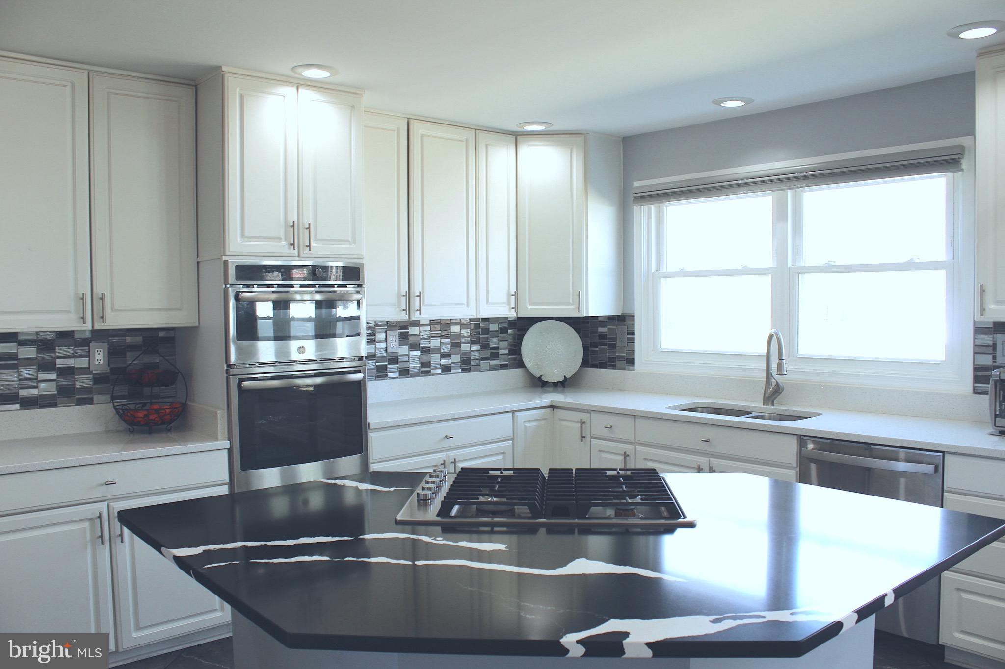11546 Waesche Drive Bowie, MD 20721 - Photo 5 of 21 a kitchen with a sink and a window