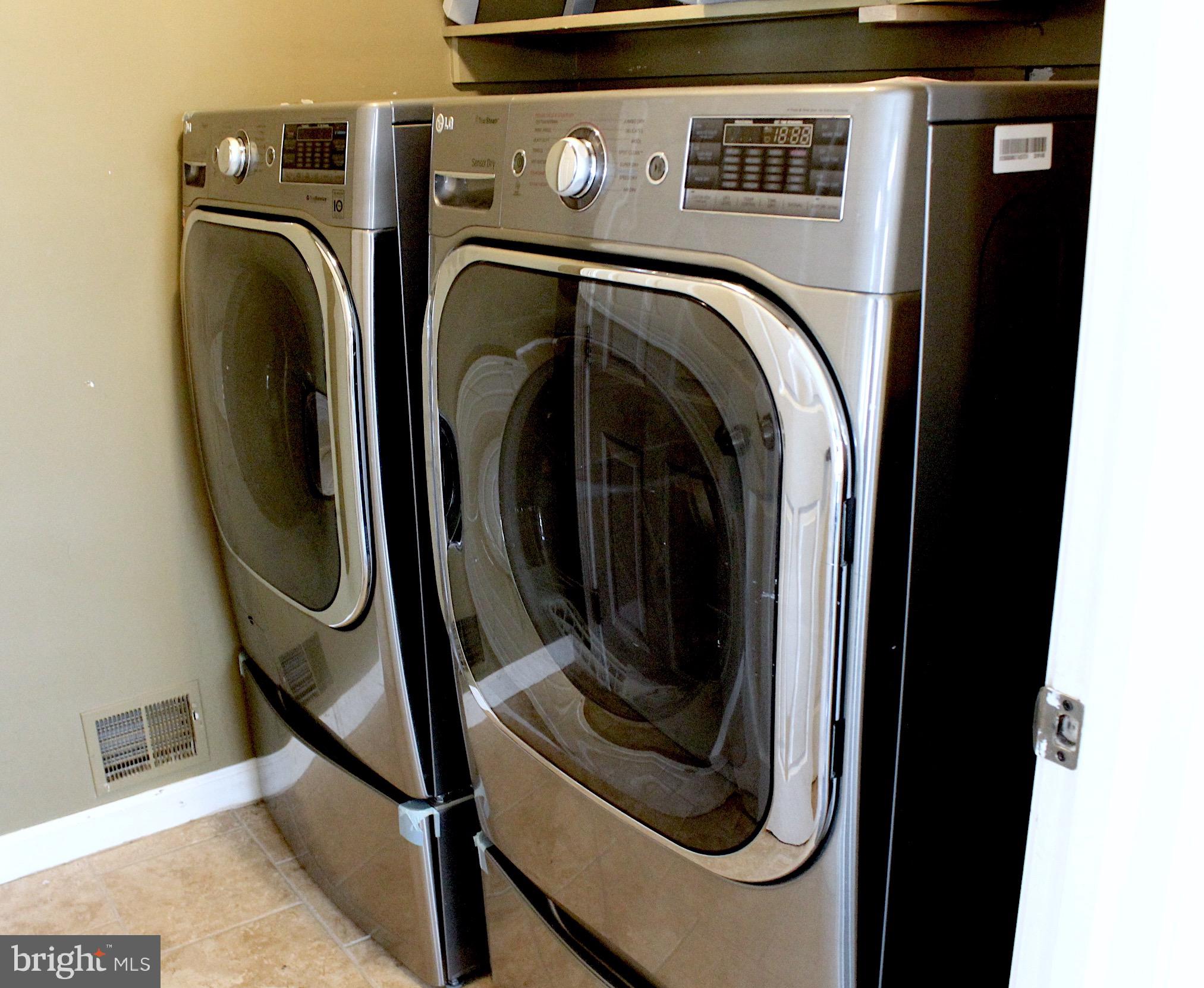 11546 Waesche Drive Bowie, MD 20721 - Photo 8 of 21 a utility room with dryer and washer