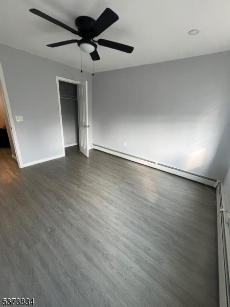 21 Alva Street Bloomfield, NJ 07003 - Photo 13 of 14 an empty room with wooden floor and windows