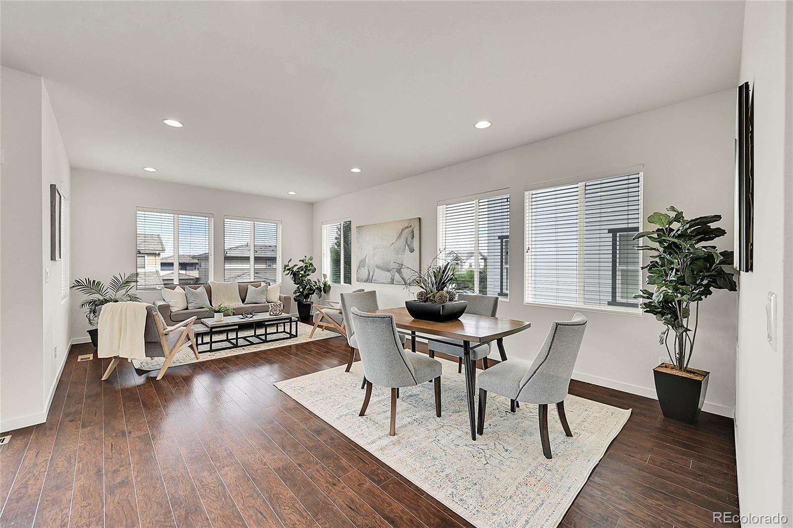 10951 Touchstone Loop Parker, CO 80134 - Photo 3 of 46 a view of a livingroom with furniture and a table