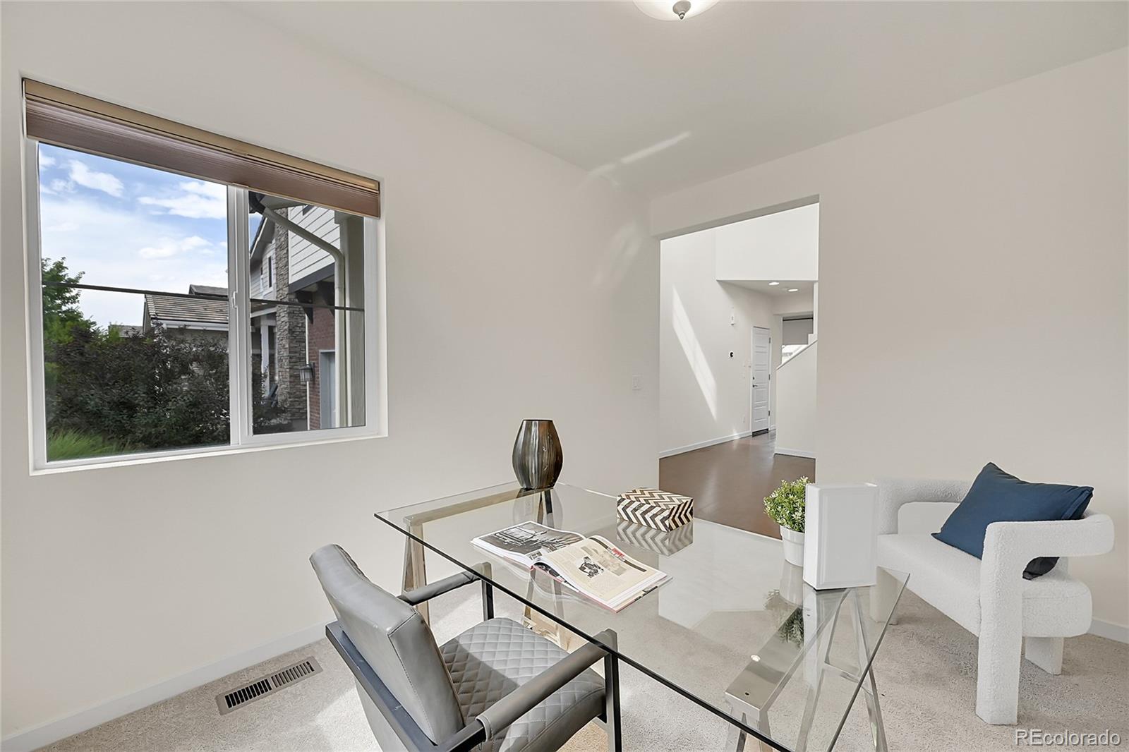 10951 Touchstone Loop Parker, CO 80134 - Photo 10 of 46 a view of a workspace with furniture