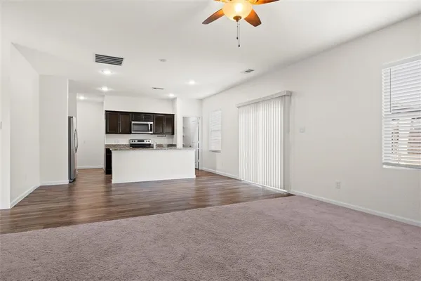 a view of kitchen and microwave