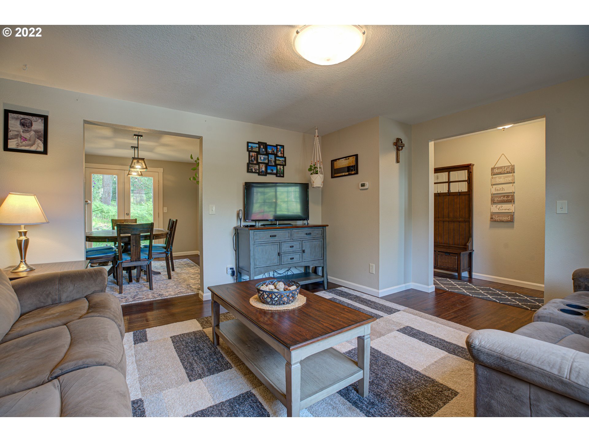 13780 Southeast Rust Way Damascus, OR 97089 - Photo 8 of 28 a living room with furniture and a table